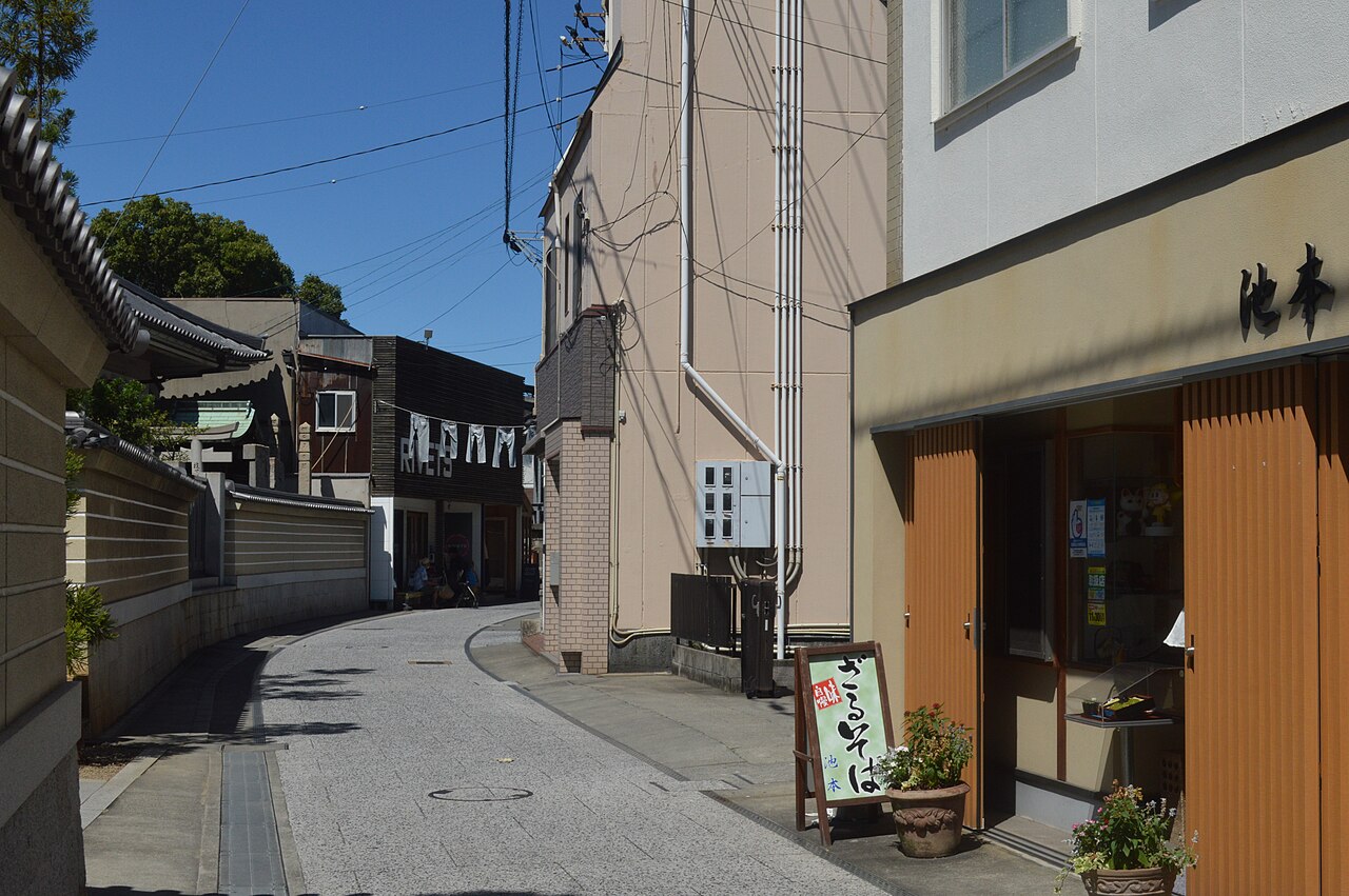 Kojima Jeans Street — 5713x3799 landscape showing the commercial street with shops.