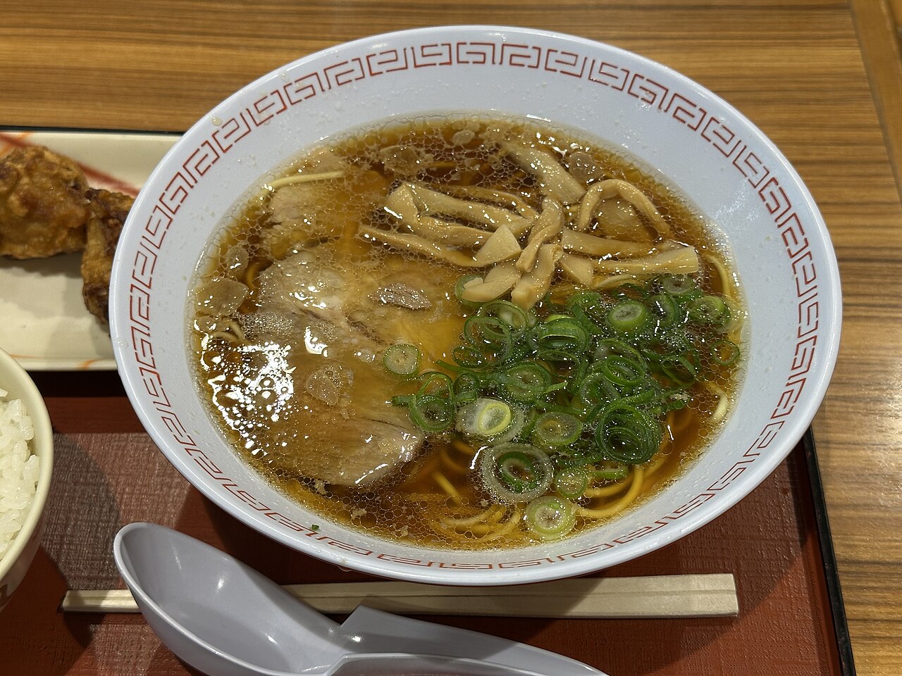 Onomichi Ramen dish — 4032x3024 showing the characteristic soy-based ramen with back fat.