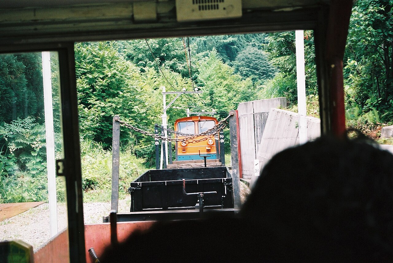 Kurobe Gorge Railway trolley train in gorge